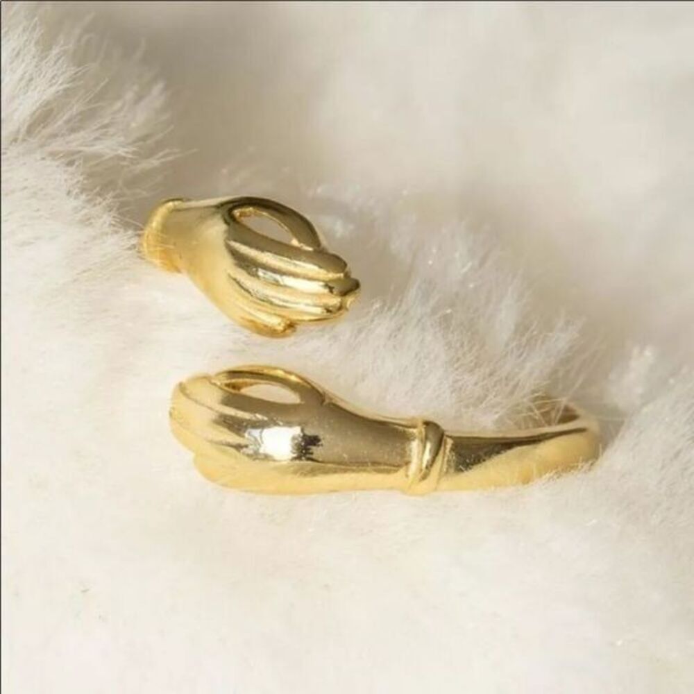 The Hold Me Close hand holding” or hug”  adjustable ring in 18k